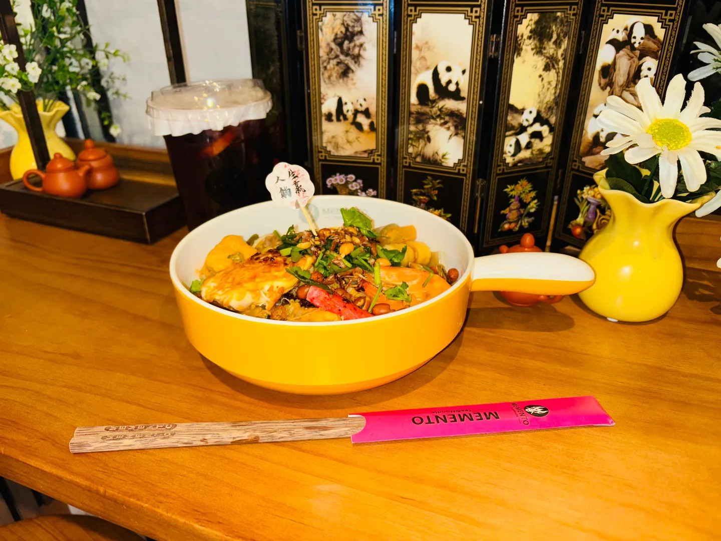 A Memento malatang bowl with noodles, vegetables and your choice of toppings