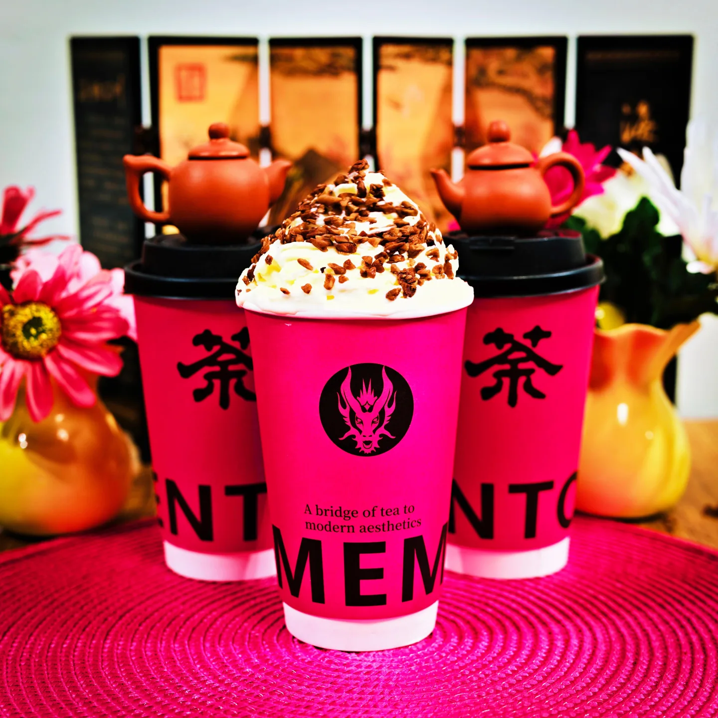 Memento milk teas in our signature pink cups